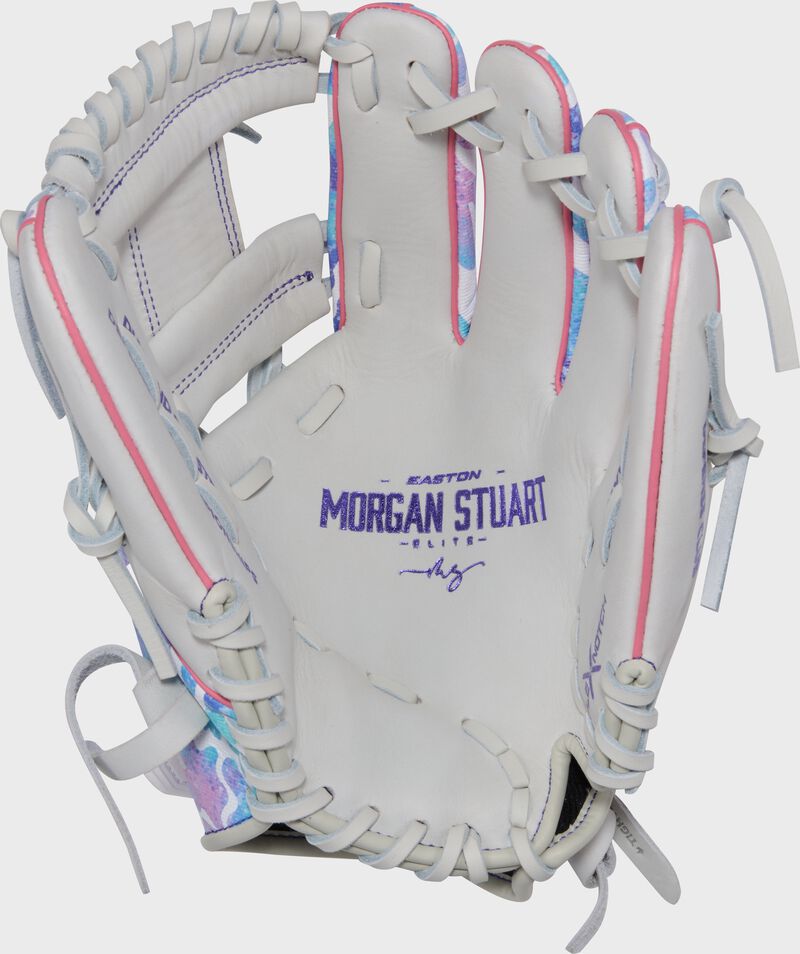 White palm of a white/tie dye Easton Morgan Stuart MYWHY 11.5" fastpitch softball glove with purple stamping