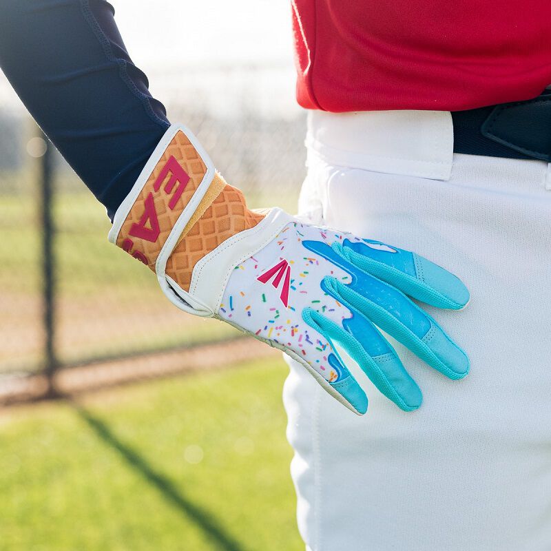 Picture of a player's hand on his hip wearing the blue right hand Walk-Off Ethos Sugar Rush batting glove