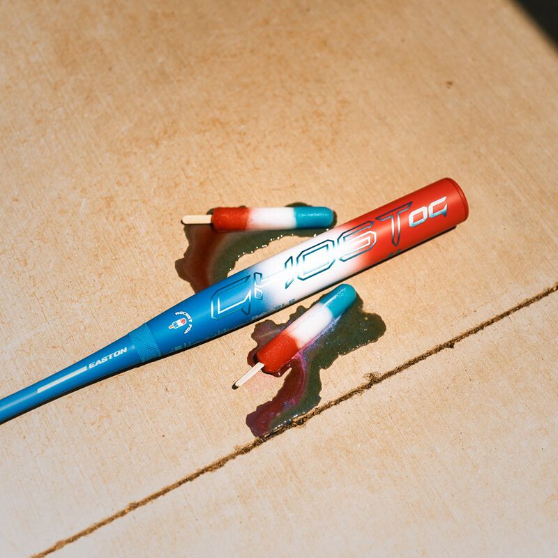 Picture of the barrel red/white/blue Easton Ghost OG Rocket Pop fastpitch bat with two melted popsicles