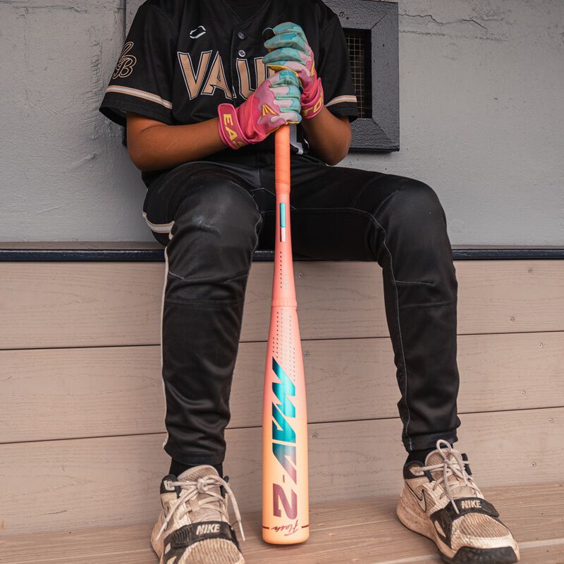 Picture of an Easton MAV2 Flash USA Baseball bat with a player in a dugout loading=