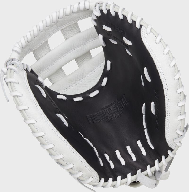 Black palm of a black/white Easton Fundamental Fastpitch 33" fastpitch catcher's mitt with white laces