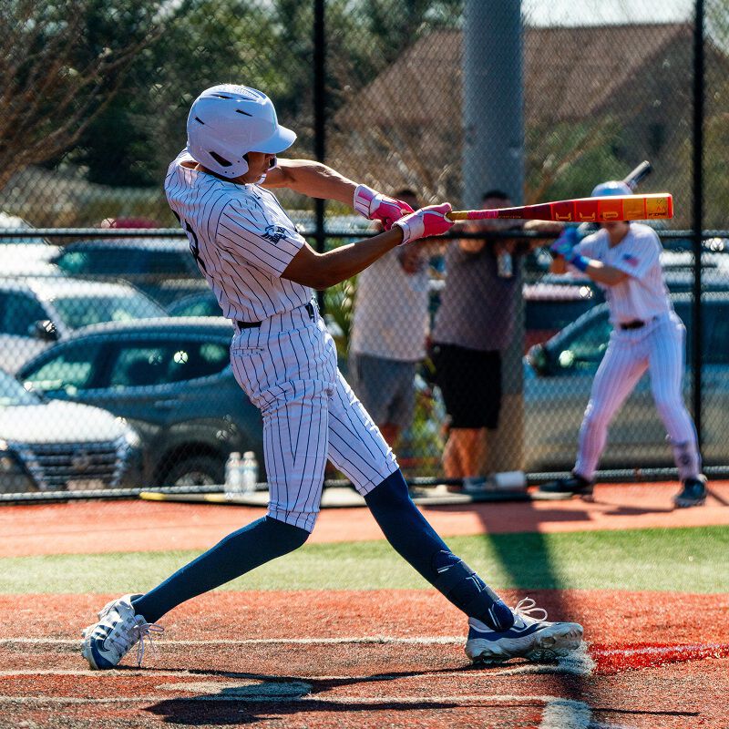 A player swinging a 2025 Hype Fire USSSA bat