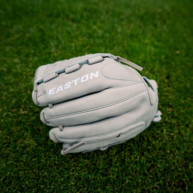 Picture of a gray Professional Collection Color Splash utility glove on a field