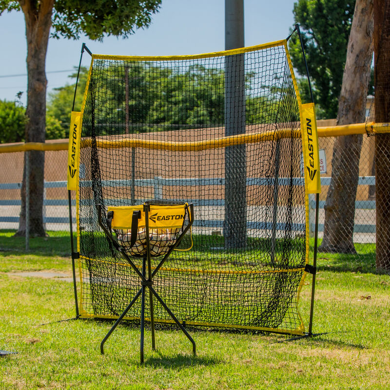 Picture of an Easton XLP training net and ball caddy on a field