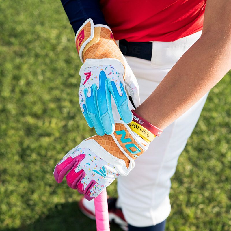 Picture of a players hands wearing Walk-Off Ethos Sugar Rush batting gloves