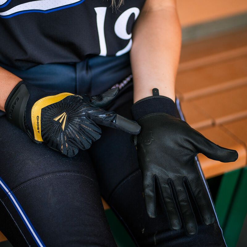 Picture of a player with a pair of black Ghost Ethos Midnight Sky fastpitch batting gloves