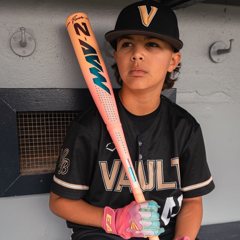 Picture of a player in a dugout with an Easton MAV2 Flash USA Baseball bat loading=