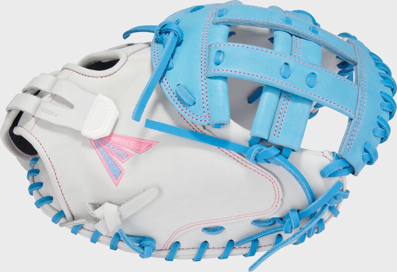 White thumb of a white/Columbia blue Easton Professional Collection 34" fastpitch catcher's mitt with a Columbia blue H-web