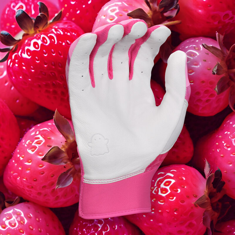 Palm of a "Strawberry Glow" Easton Ghost Ethos fastpitch batting glove with a pink strawberry theme background