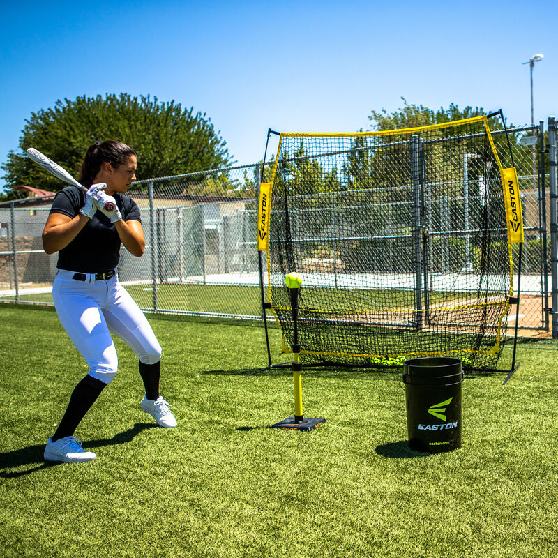 Picture of a player hitting into an Easton XLP training net on a field