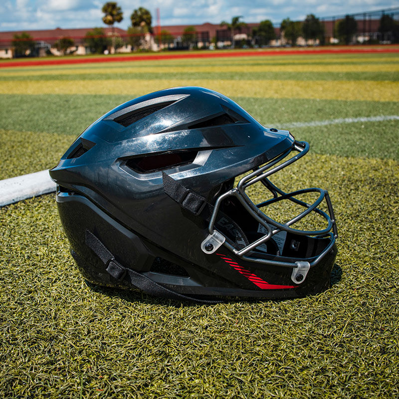 Right side of a Hellcat pitcher's helmet next to the mound on a field - SKU: EHCATH