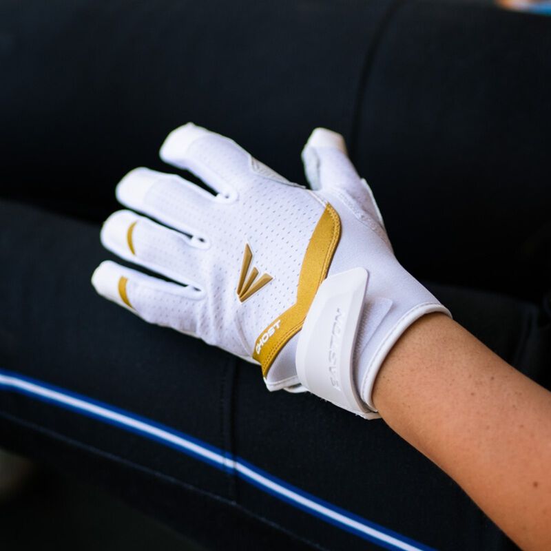 Picture of a white Ghost Ethos Snowstorm fastpitch batting glove on a player's hand