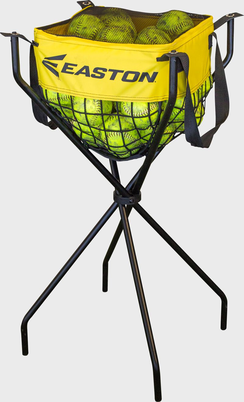 A yellow/black Easton Ball Caddy filled with softballs loading=